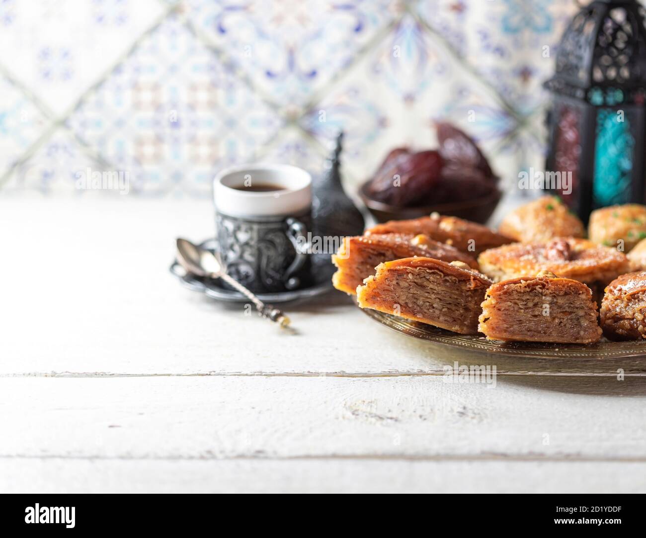 Ramadan kareem with arabic coffee and traditional arabic dessert