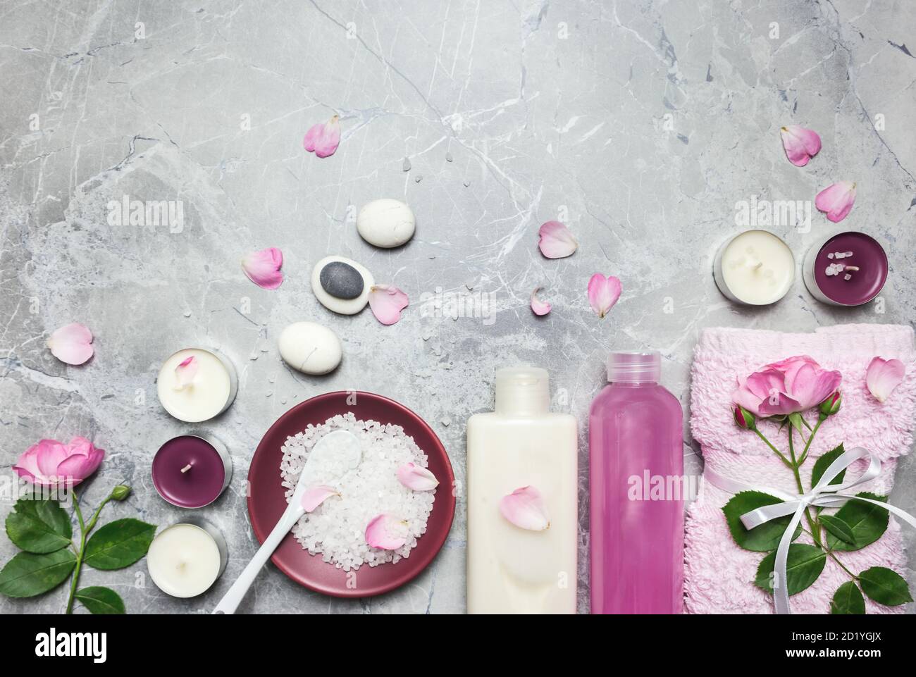 Female skin and body care cosmetic products on gray marble background. Beauty blogger, salon treatments concept. Flat lay, top view with copy space. Stock Photo