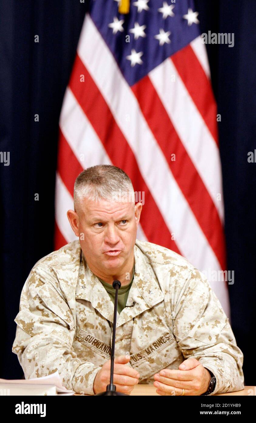 Brigadier-General C. Mark Gurganus, commanding-general, Ground Combat Element, Multi-National Force-West, speaks to the media in a joint media conference with Major-General William B. Caldwell IV, Multi-National Force-Iraq Spokesman,  at the heavily fortified Green Zone area in Baghdad May 16, 2007. REUTERS/Ali Abbas/Pool  (IRAQ) Stock Photo