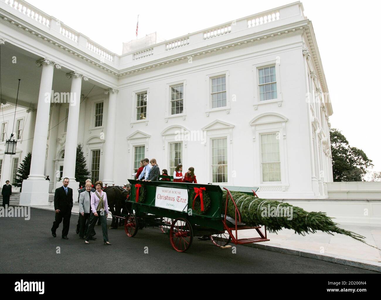 The White House Christmas Tree An 18 1 2 Foot Tall Douglas Fir Tree From Pennsylvania Is Delivered To First Lady Laura Bush Bottom R At The North Portico Of The White House November 27