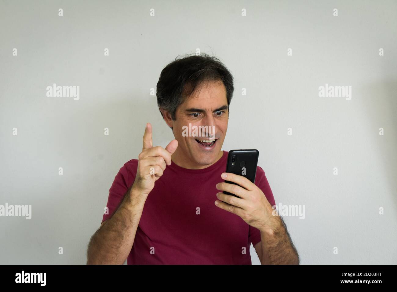Man speaking using video call on smartphone. Stock Photo