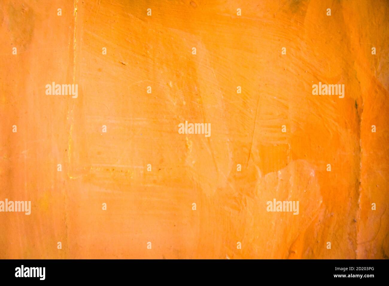 Orange painted on paper background texture Stock Photo