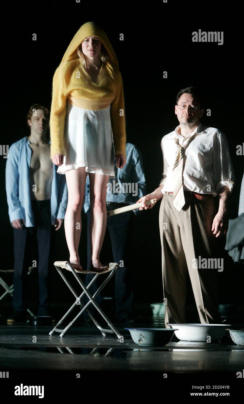 Actors Julia Jentsch and Wolfgang Pregler (R) perform on stage in William  Shakespeare's play "Troilus and Cressida" during a dress rehearsal at  Vienna's Theater an der Wien May 8, 2008. The play