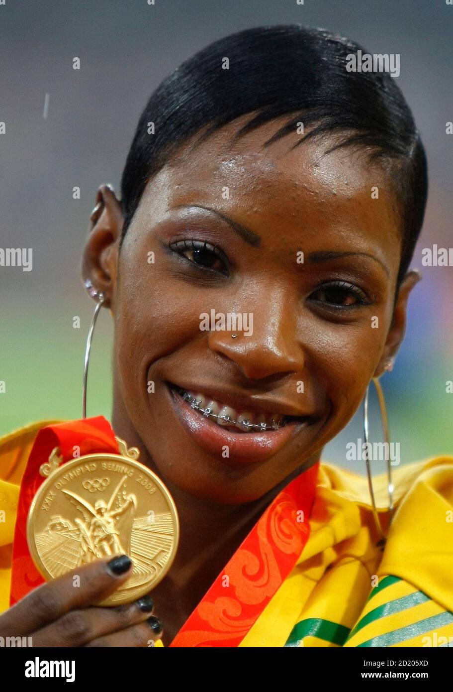 Gold medallist Melaine Walker of Jamaica poses during the medal ceremony for the women's 400m hurdles event of the athletics competition at the Beijing 2008 Olympic Games August 21, 2008.     REUTERS/Mike Blake (CHINA) Stock Photo