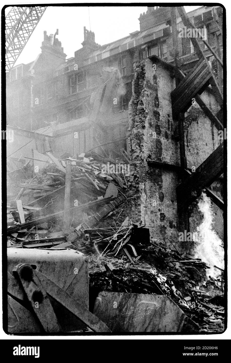 London views in the mist November 1968 Builders knocking down a WWII damaged building in the City of London Stock Photo