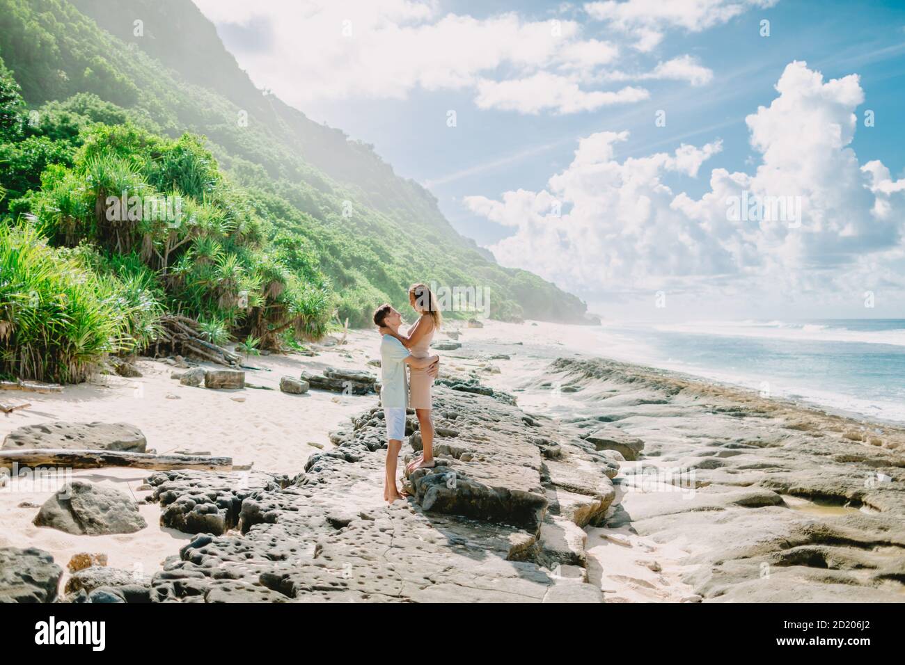 January 28, 2020. Bali, Indonesia. Happy couple at tropical ocean beach. Honeymoon in paradise island Stock Photo
