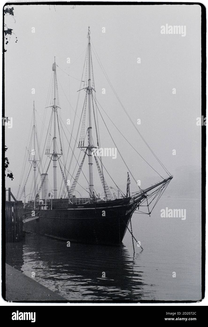 London views in the mist November 1968 The River Thames, London England in misty foggy conditions. Captain Scotts ship The Discovery. Wikipedia: RRS Discovery is a barque-rigged auxiliary steamship built for Antarctic research, and launched in 1901. She was the last traditional wooden three-masted ship to be built in the United Kingdom. Her first mission was the British National Antarctic Expedition, carrying Robert Falcon Scott and Ernest Shackleton on their first, and highly successful, journey to the Antarctic, known as the Discovery Expedition. Stock Photo