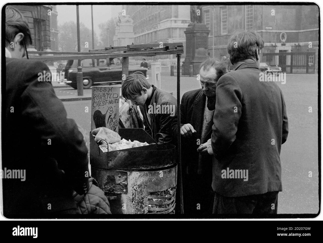London views in the mist November 1968 Hot Chestnut seller, in Whitehall, Westmister London Stock Photo