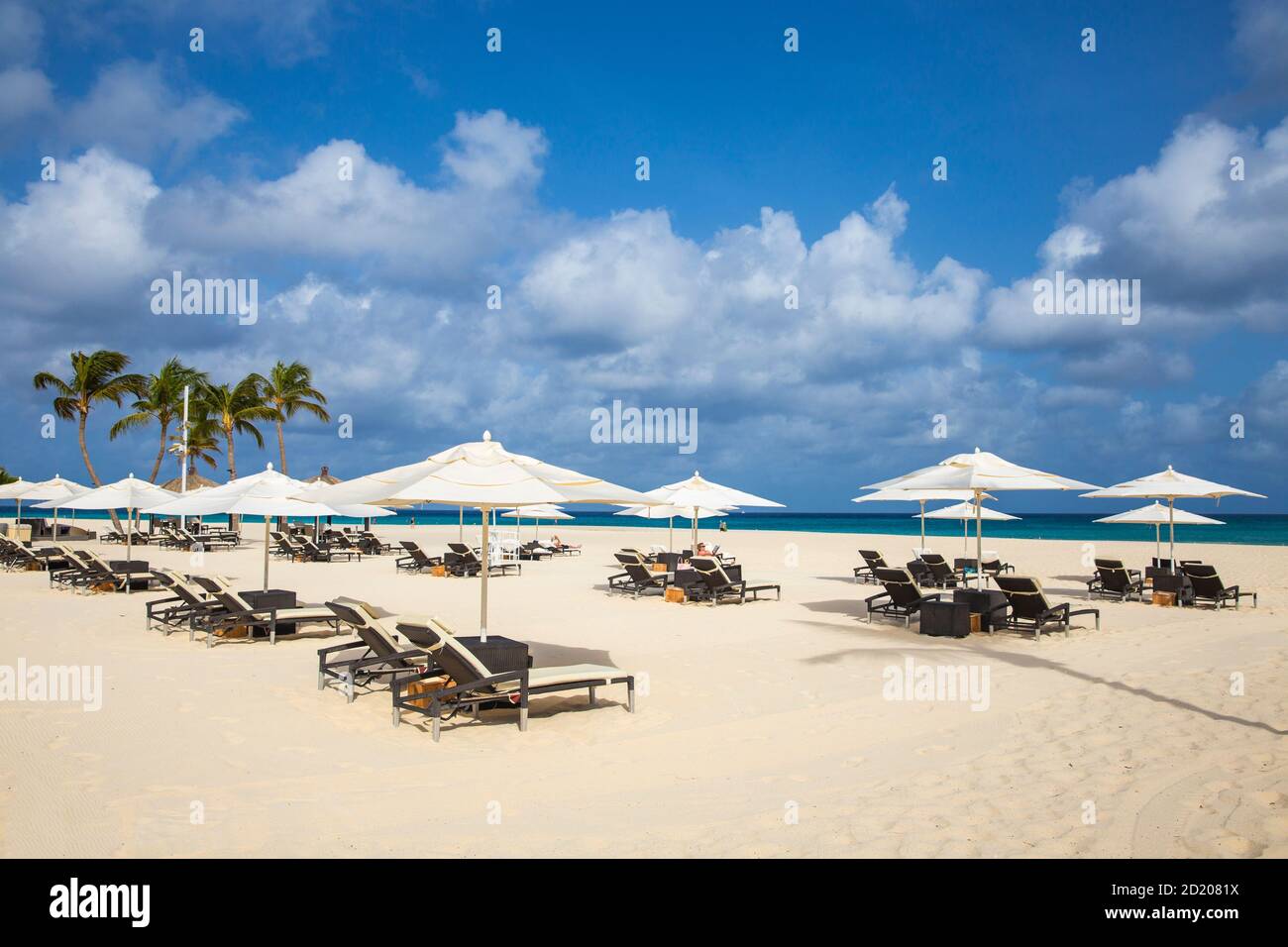 Caribbean, Netherland Antilles, Aruba, Manchebo beach, Sunloungers outside Bucuti and Tara Resort Stock Photo
