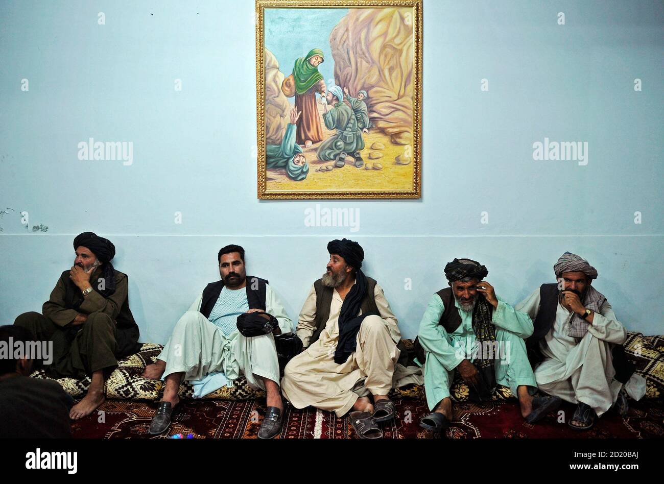 Afghan Pashtun Leaders Listen To Afghan President Hamid Karzai Speak At A Meeting With Tribal Leaders In Kandahar City June 13 2010 Karzai Visited The Taliban S Spiritual Home On Sunday Launching A