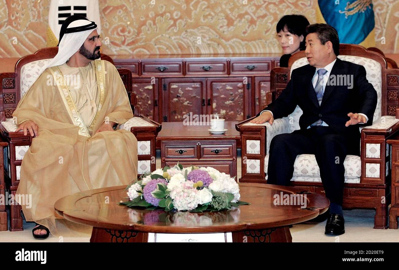 United Arab Emirates Prime Minister And Ruler Of Dubai Sheikh Mohammed Bin Rashid Al Maktoum L Talks With South Korea S President Roh Moo Hyun During Their Meeting At President House In Seoul May 22