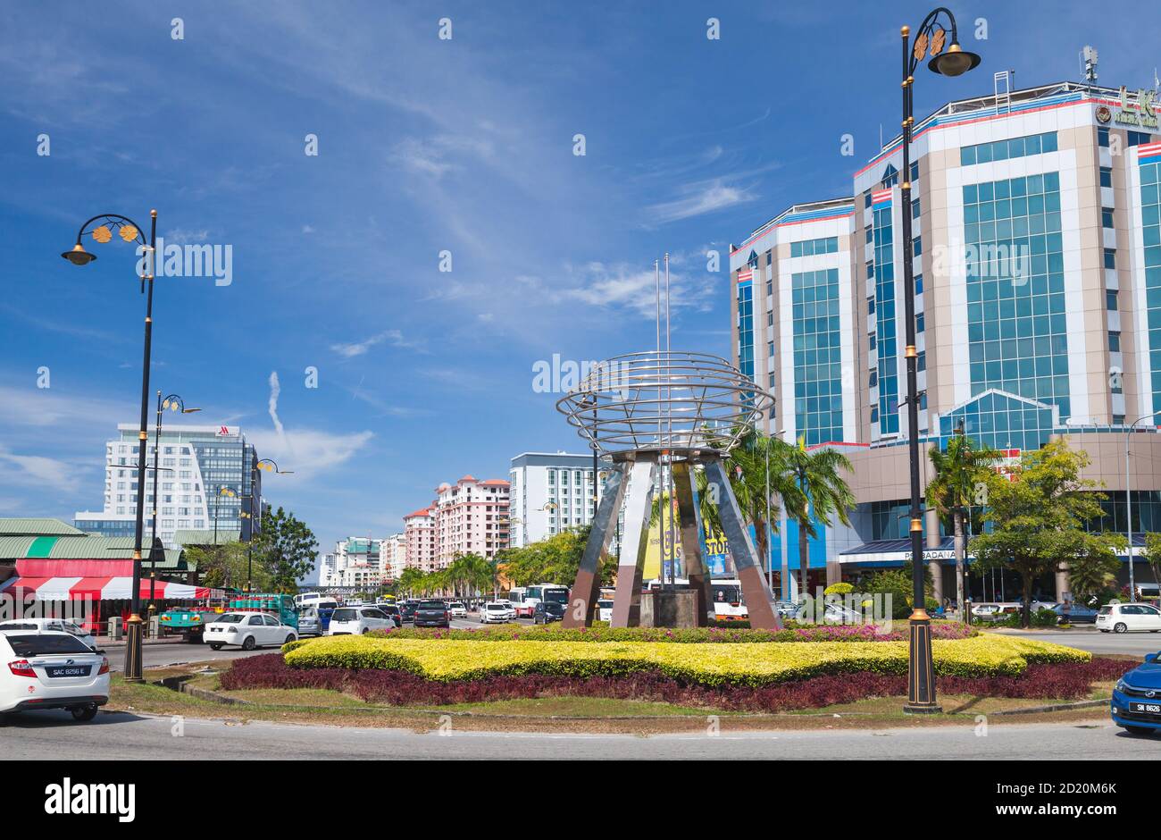 Kota Kinabalu, Malaysia - March 17, 2019: Kota Kinabalu street view, modern monument mounted on a roundabout Stock Photo