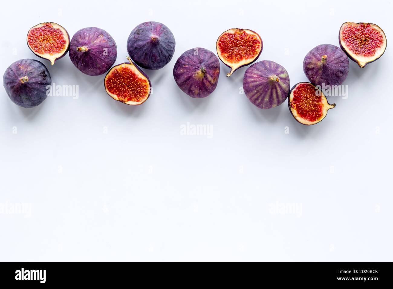 Flat lay of figs on a kitchen table, top view Stock Photo