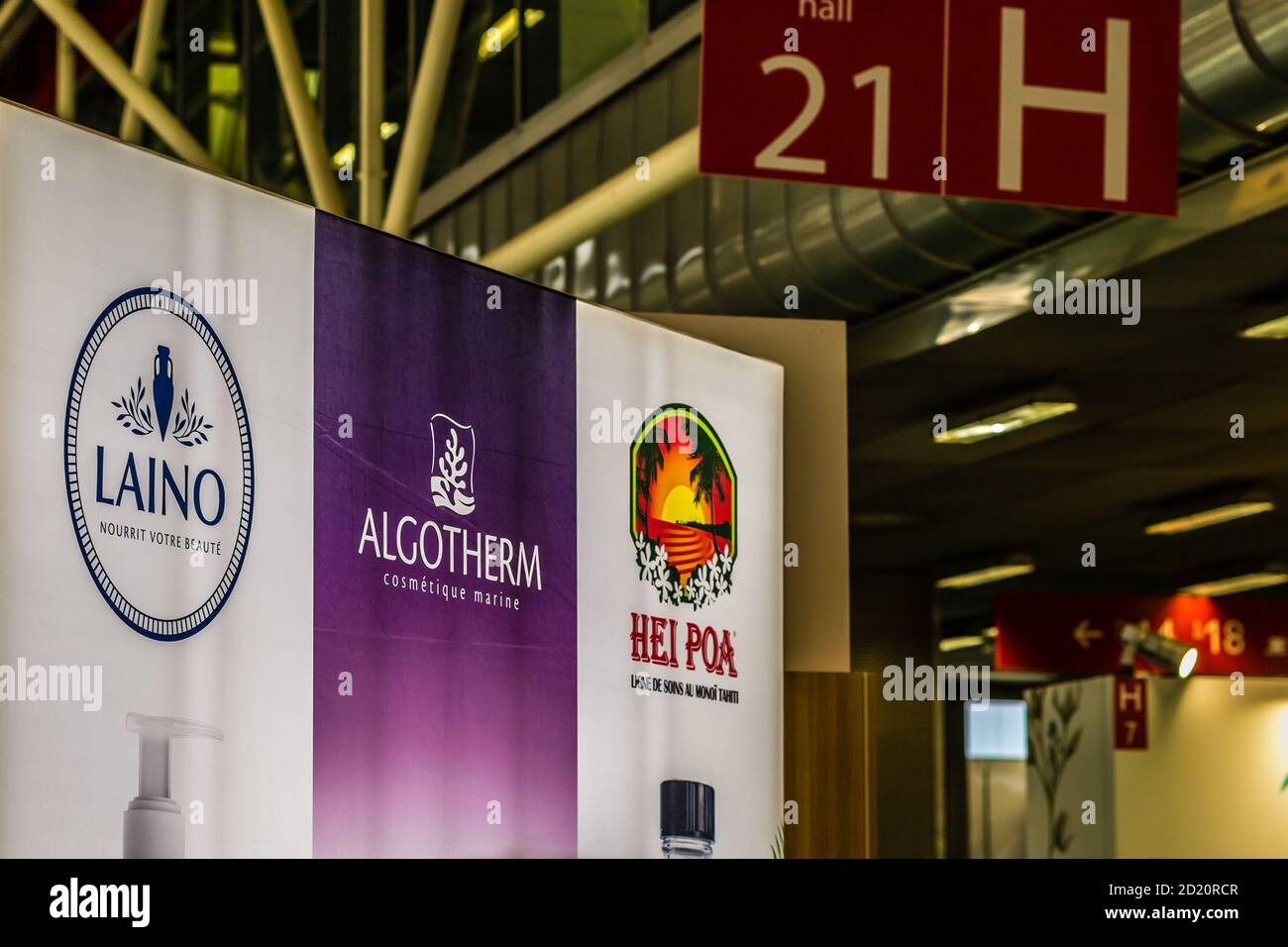 BOLOGNA (BO), ITALY - MARCH 14, 2019: light is enlightening LAINO, ALGOTHERM, HEI POA brand logos at COSMOPROF, trade show of the beauty industry Stock Photo