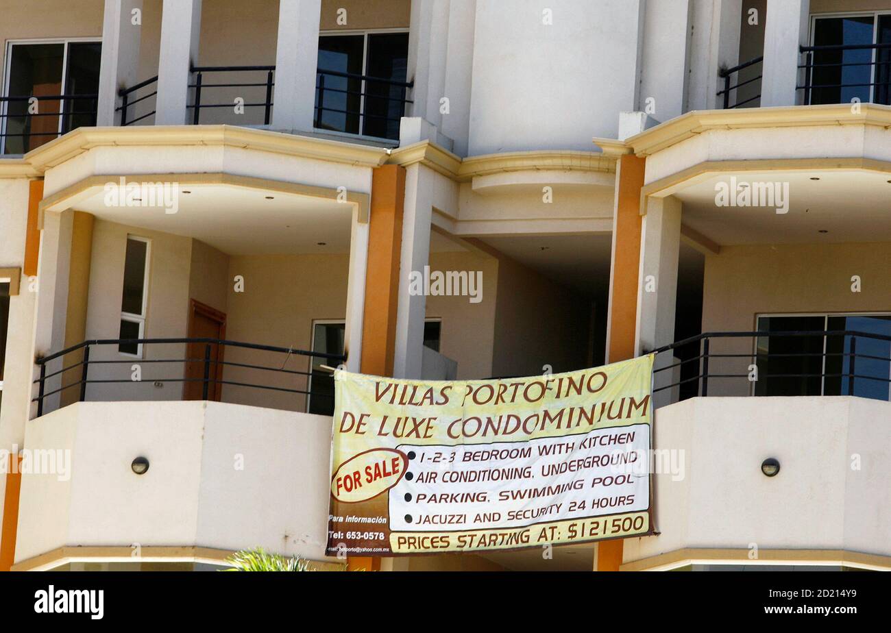 A Banner Advertising For Luxury Condominiums Hangs From A Building In Tamarindo Beach Guanacaste 250 Miles A Banner Advertising For Luxury Condominiums Hangs From A Building In Tamarindo Beach Guanacaste 250 Miles