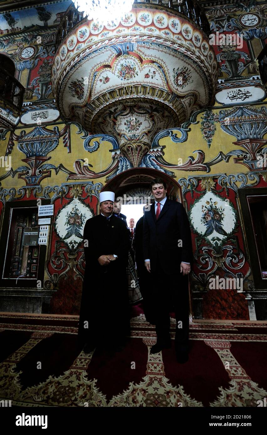 Albanian President Bamir Topi (R) and his wife is welcomed by Macedonian  head of Islamic community Sulejman Rehxepi at the "Colored Mosque" in  Tetovo. REUTERS/Ognen Teofilovski (MACEDONIA - Tags: POLITICS) RELIGION  Stock