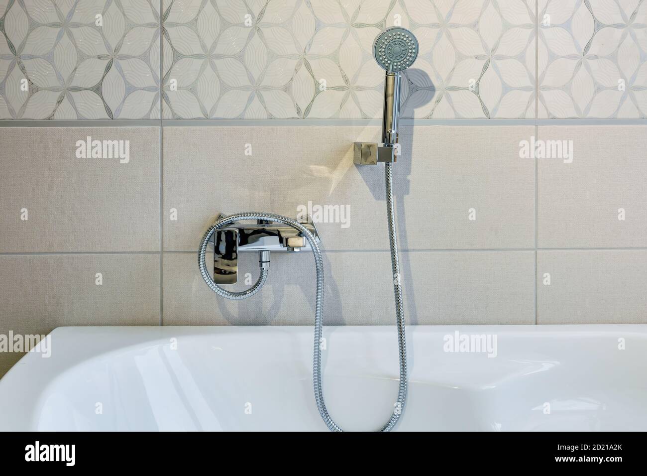 water tap sink with faucet in expensive loft bathroom. detail of a corner  shower cabin with wall mount shower attachment Stock Photo - Alamy