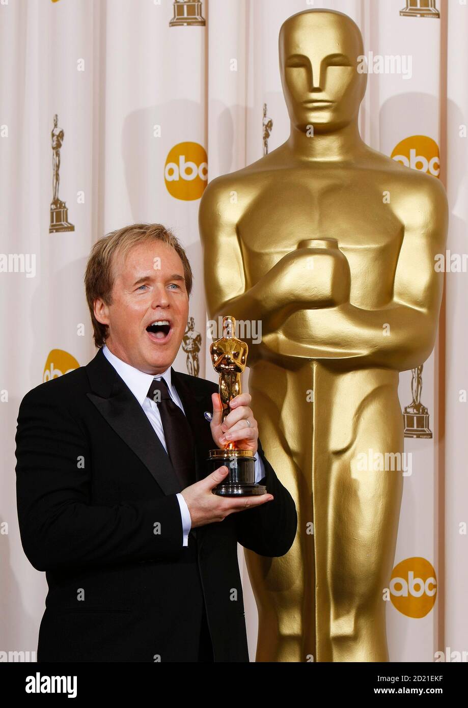 Writer/director Brad Bird celebrates with his Oscar statuette after winning  Best Animated Feature for his work with the film 