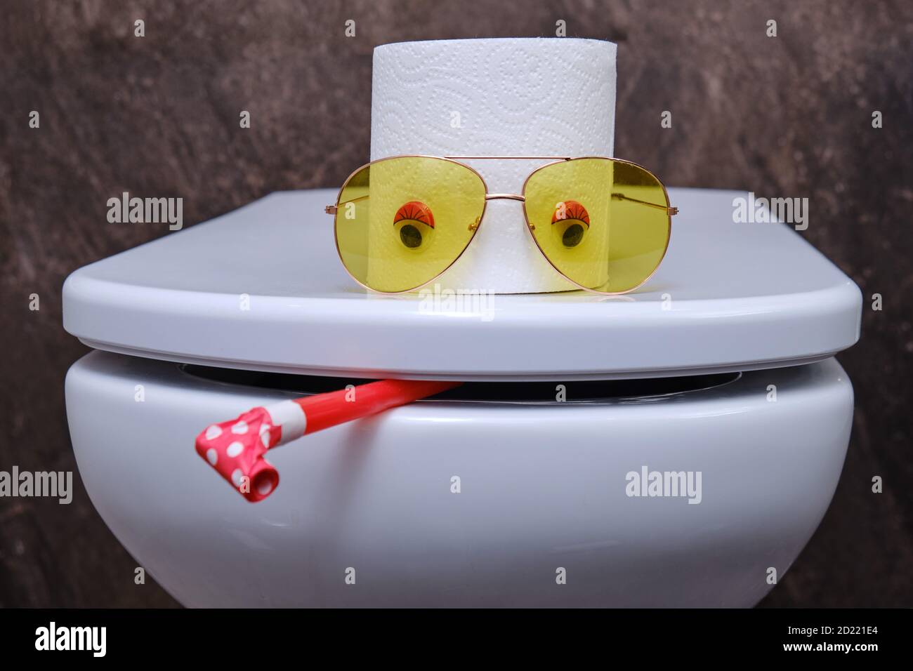 Funny face from a roll of toilet paper with glasses Stock Photo Alamy