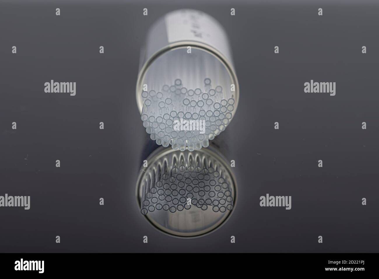 Hematocrit Capillary Tube. Medical capillary glass tubes on black