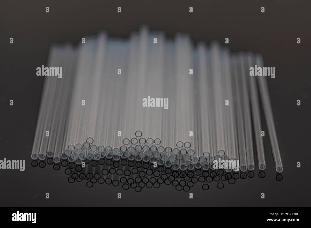 Hematocrit Capillary Tube. Medical capillary glass tubes on black