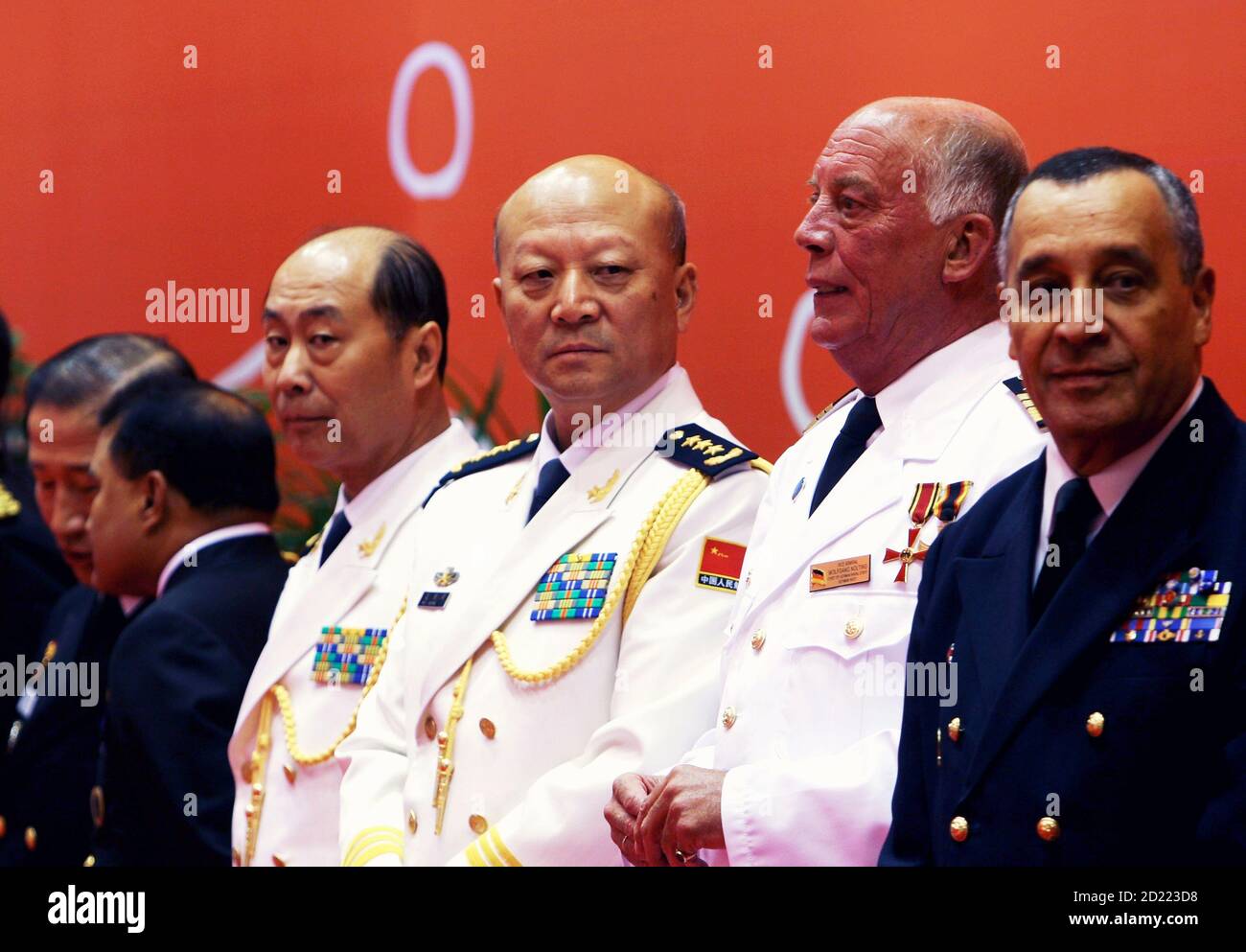 Chinese Navy Commander Admiral Wu Shengli (C) stands next to Vice Admiral  Wolfgang Nolting, Chief of German Naval Staff (2nd R), as he attends an  opening ceremony to mark the 60th anniversary