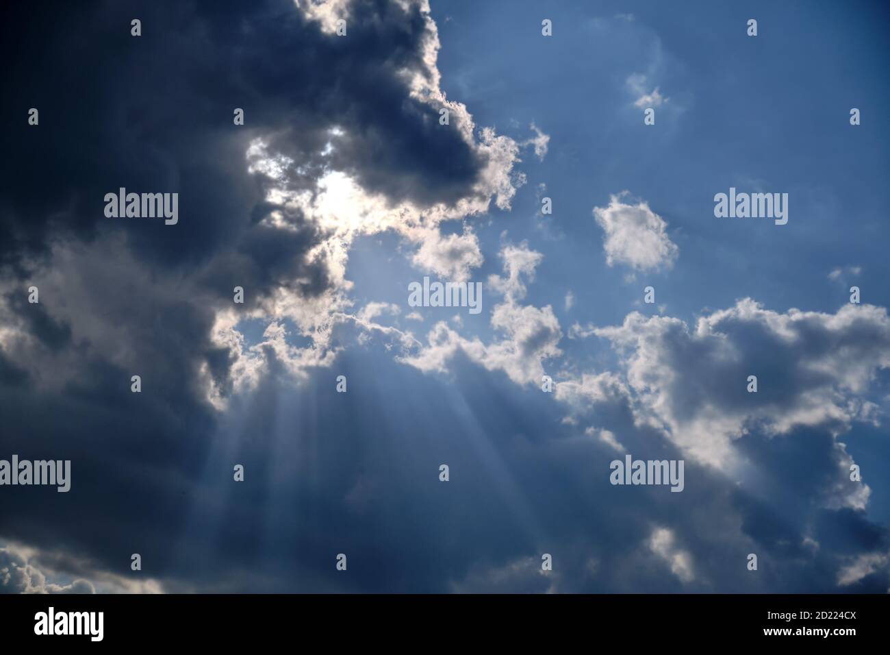 Storm clouds in a dramatic sky with breaking rays of the sun Stock ...