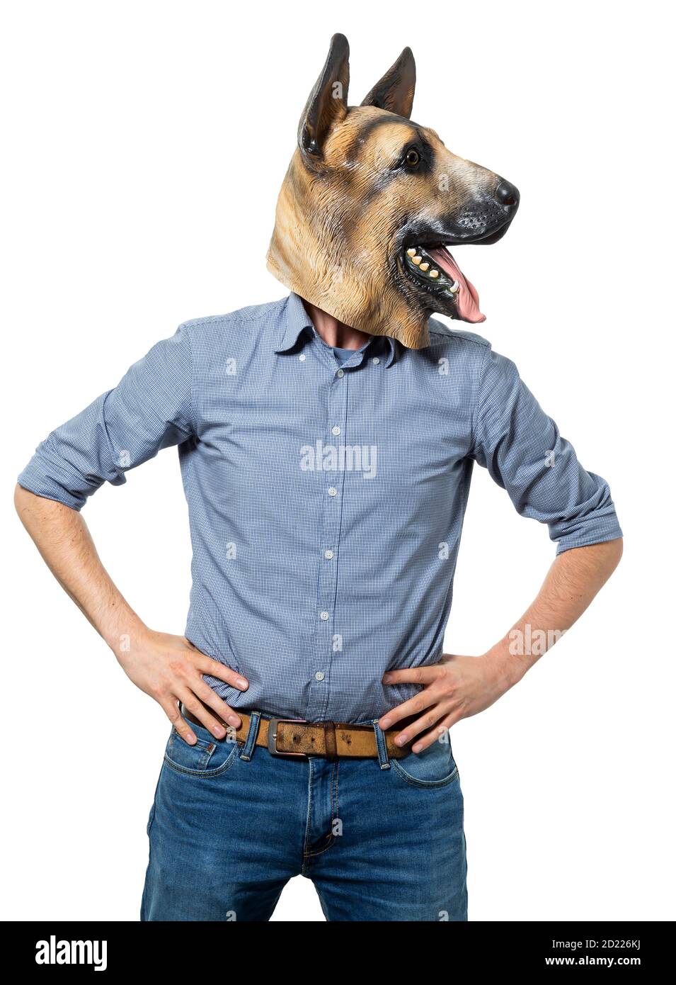 Man wearing dog mask with hands on hips and head turned looking away