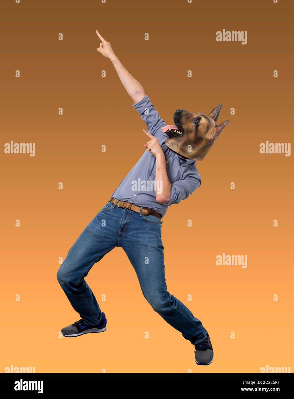 Man in dog mask celebrating with index finger pointing up. Isolated