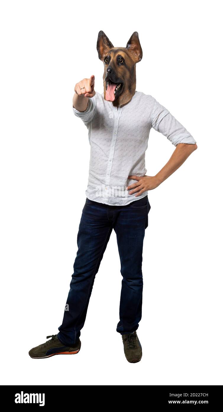Man wearing dog mask pointing towards camera. Full length. Isolated