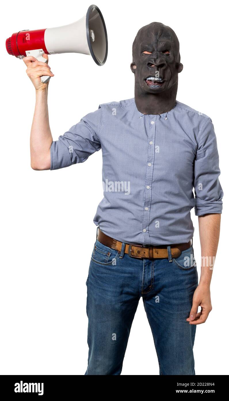 Man wearing gorilla mask holding up megaphone next to head. Isolated