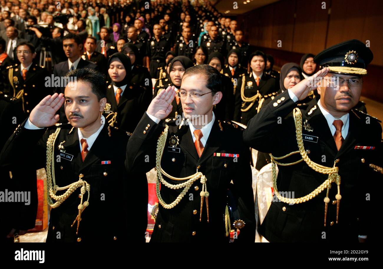 Malaysian Anti Corruption Commission Macc Officers Salute During The National Anthem At Macc S Launch In Kuala Lumpur February 24 2009 Reuters Zainal Abd Halim Malaysia Stock Photo Alamy