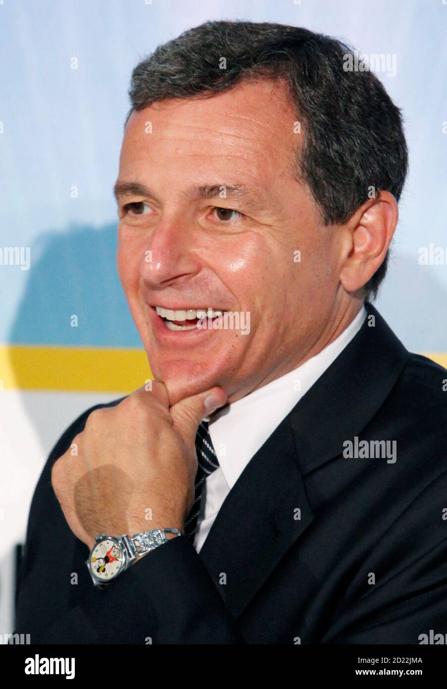 President and CEO of Walt Disney Co, Bob Iger, listens to a question as he  wears his 1933 Mickey Mouse Ingersoll Watch Company vintage watch during a  news conference at Disney's D23