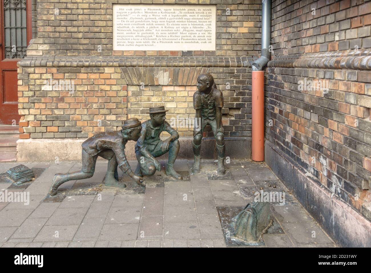 A group of statues depicting the Paul Street Boys (Pal utcai fiuk) from the novel by Ference Molnar in Budapest Stock Photo