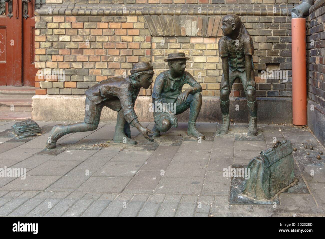 A group of statues depicting the Paul Street Boys (Pal utcai fiuk) from the novel by Ference Molnar in Budapest Stock Photo