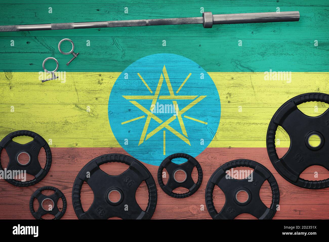 Ethiopia gym concept. Top view of heavy weight plates with iron bar on