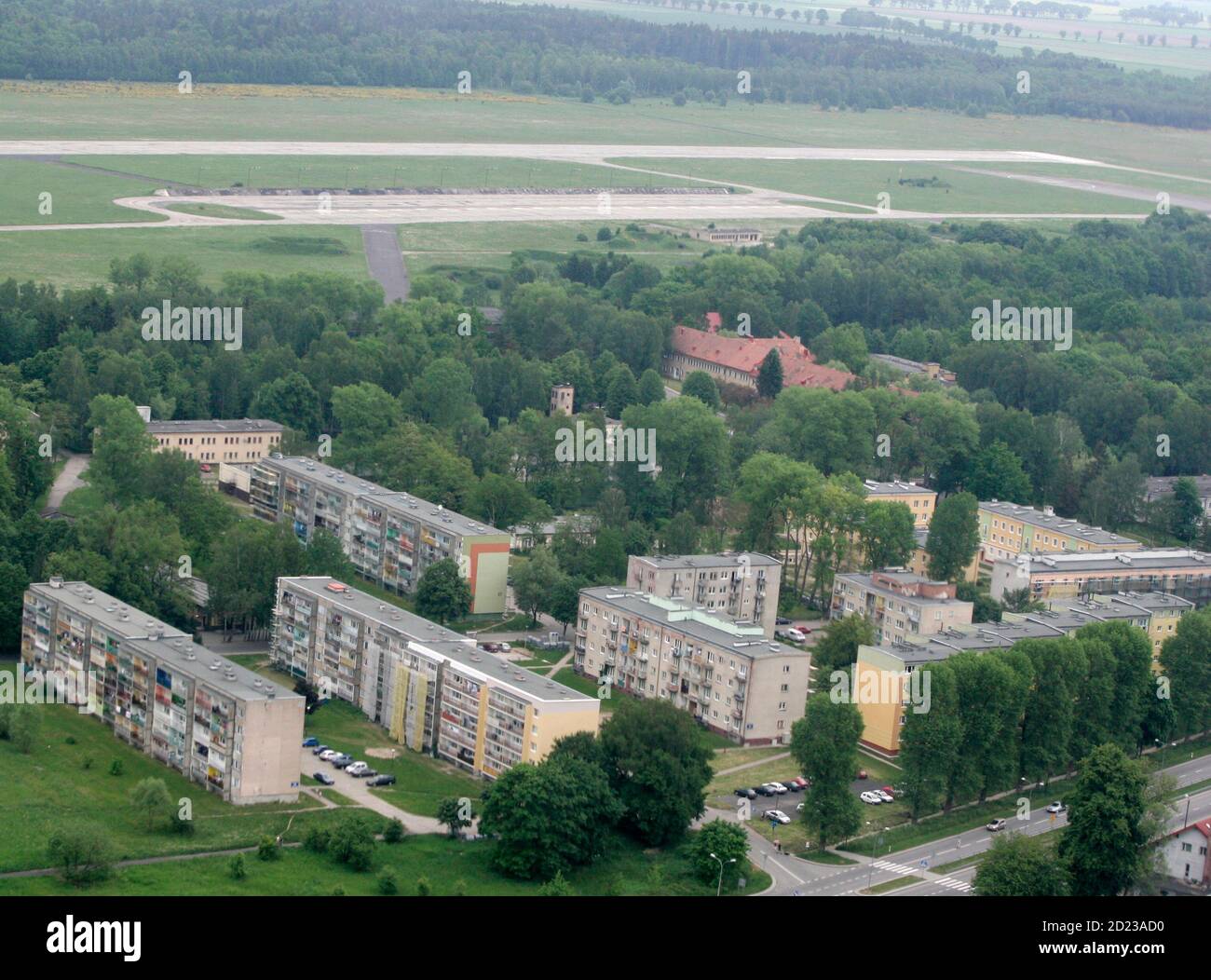 Aerial view of airfield and existing Polish military base with a housing estate in Redzikowo near Slupsk, northern Poland, May 27, 2007. The future location of the U.S. anti-missile shield in Poland is still an official secret but in the northern city of Slupsk the locals already know they may live next to it. The facility, which has caused controversy in Europe and anger in Moscow, is a hot topic in Slupsk and nearby Redzikowo, an ex-military airfield poised to house the rocket silos and about 200 U.S. military personnel.   To match feature SHIELD-POLAND/   REUTERS/Kacper Pempel (POLAND) Stock Photo