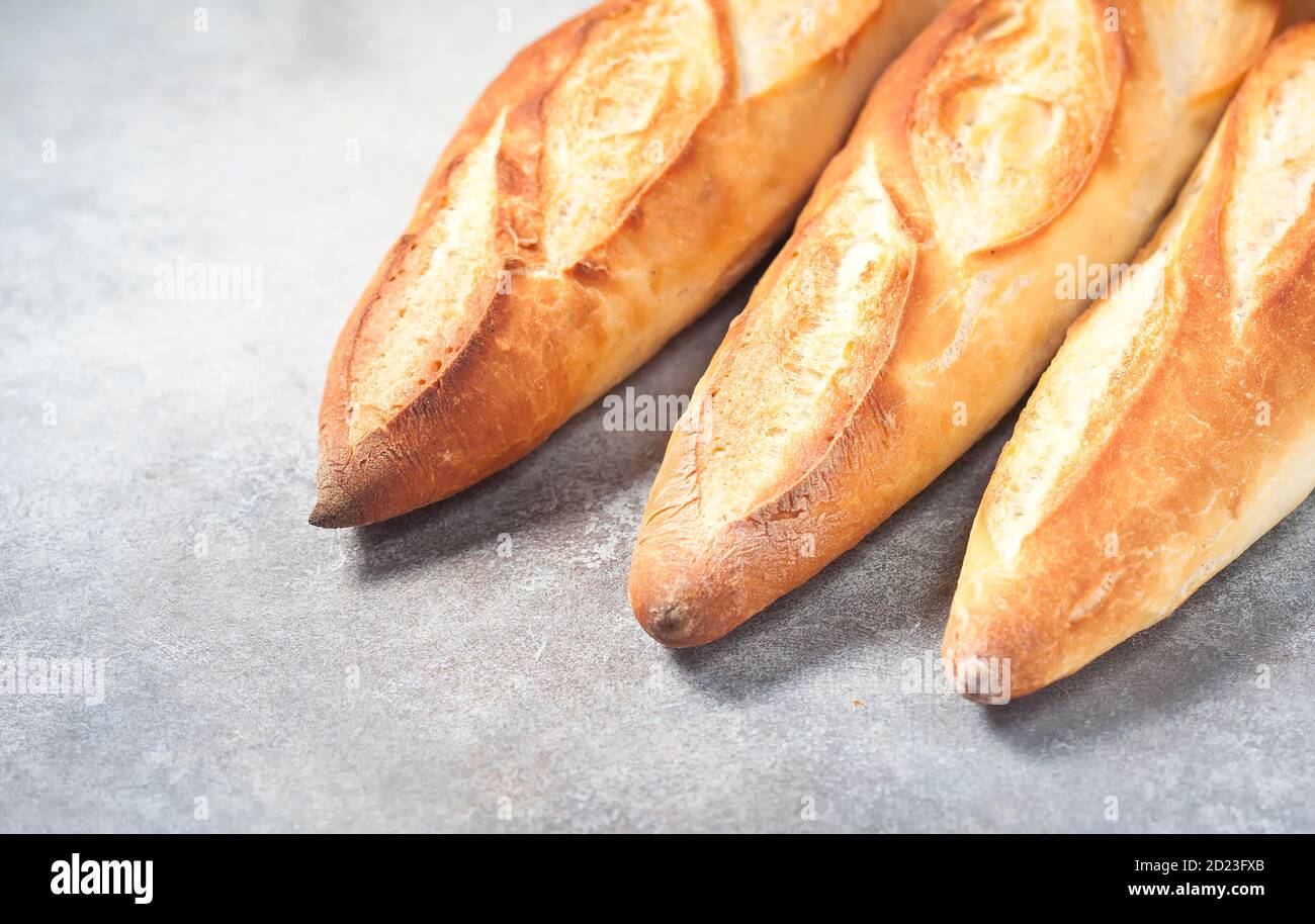 Fresh homemade crispy baguette in an eco bag. eco style no plastic. Copy space. Stock Photo