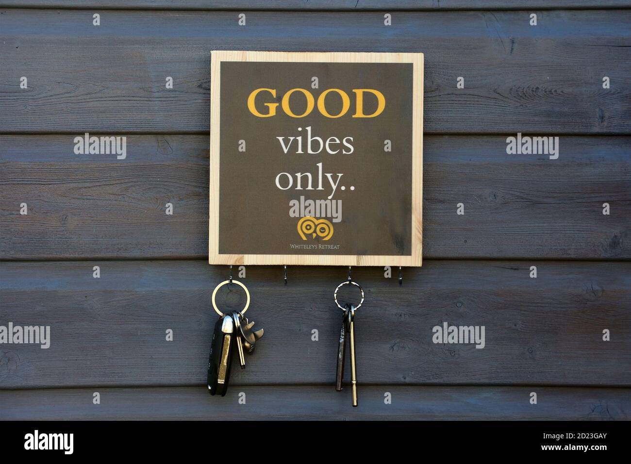 Motivational statements printed onto old wooden floorboard for coastes
