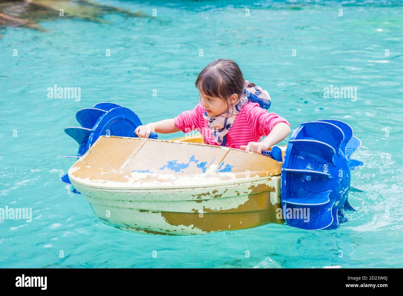 Young girl in hand paddle boat Stock Photo Alamy