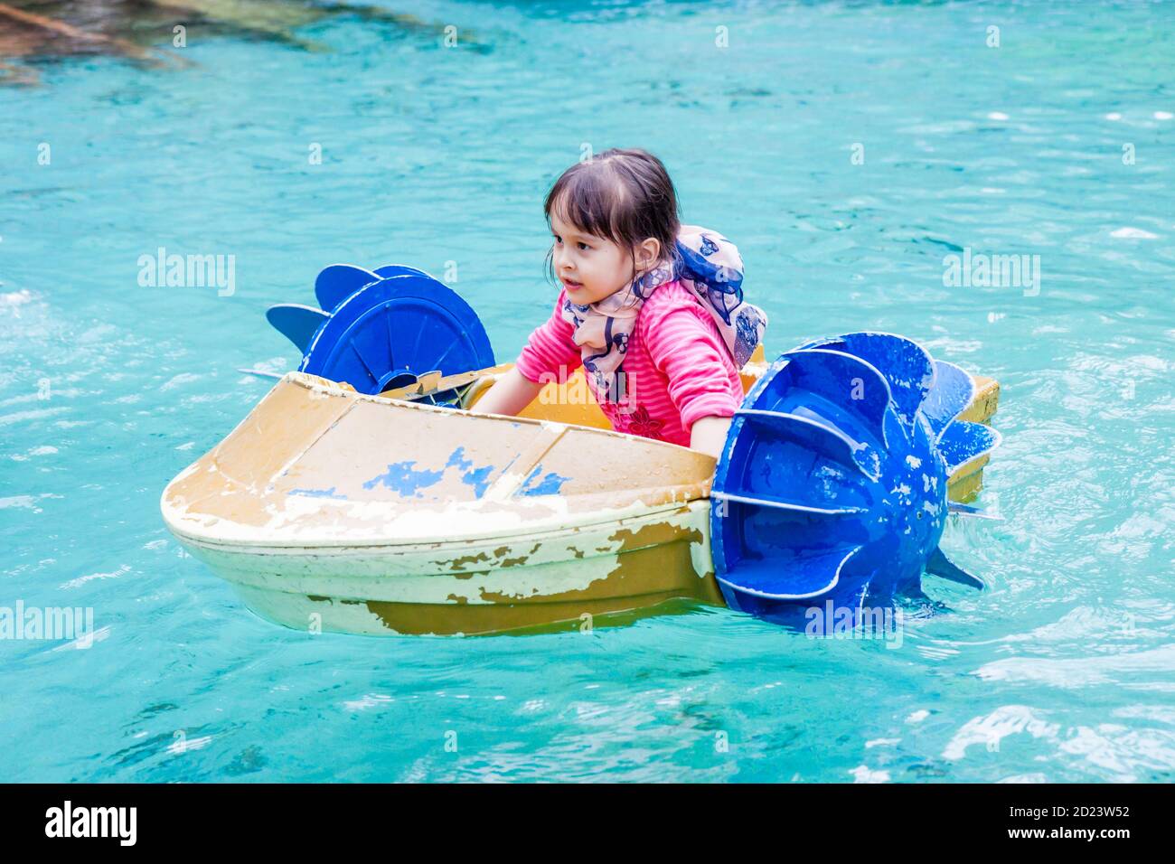 Young girl in hand paddle boat Stock Photo Alamy