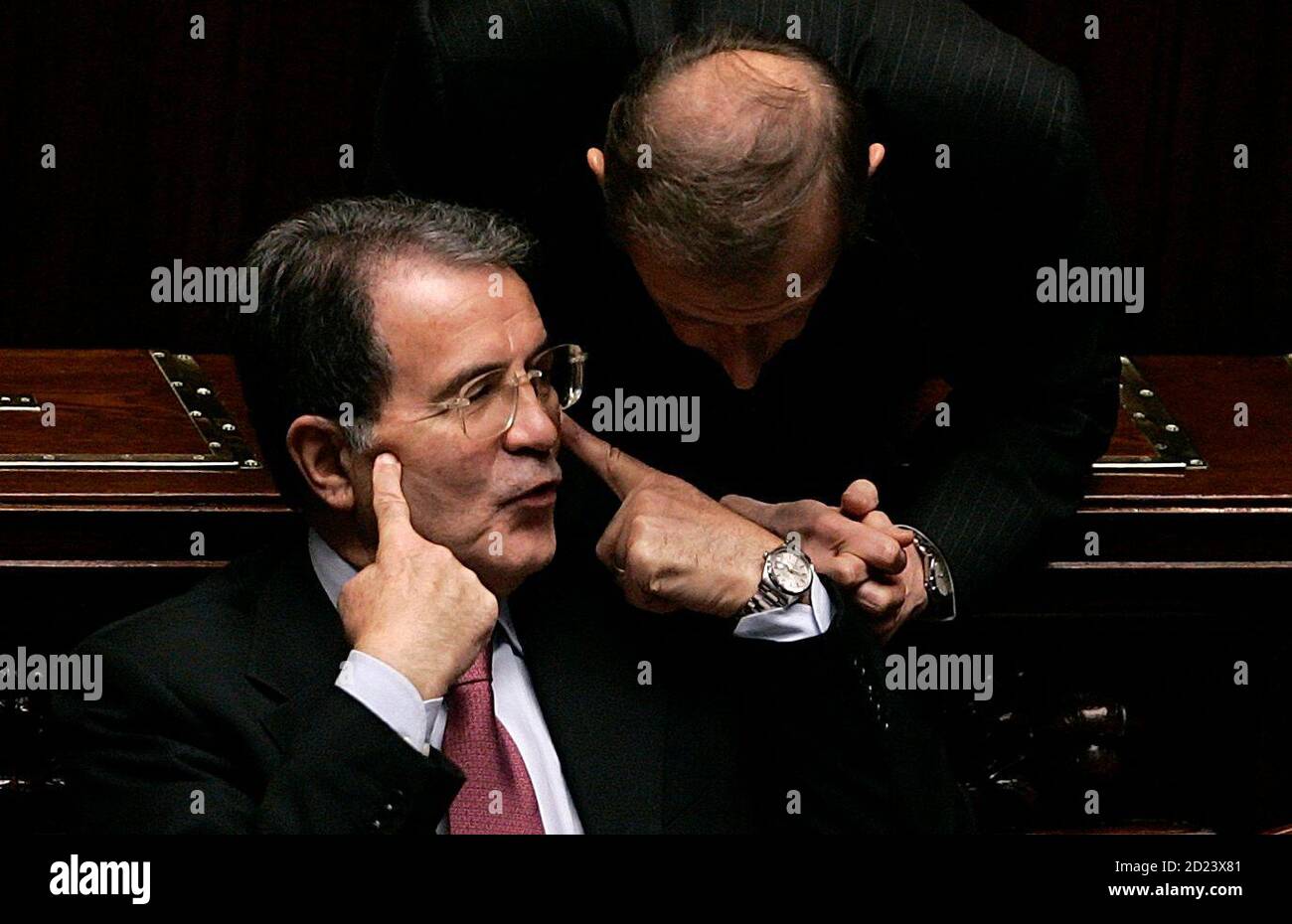 Italian Prime Minister Romano Prodi L Gestures As He Talks With Lawmaker Piero Fassino At The Lower House Of The Parliament In Rome January 23 2008 Prodi Rallied Support On Wednesday For