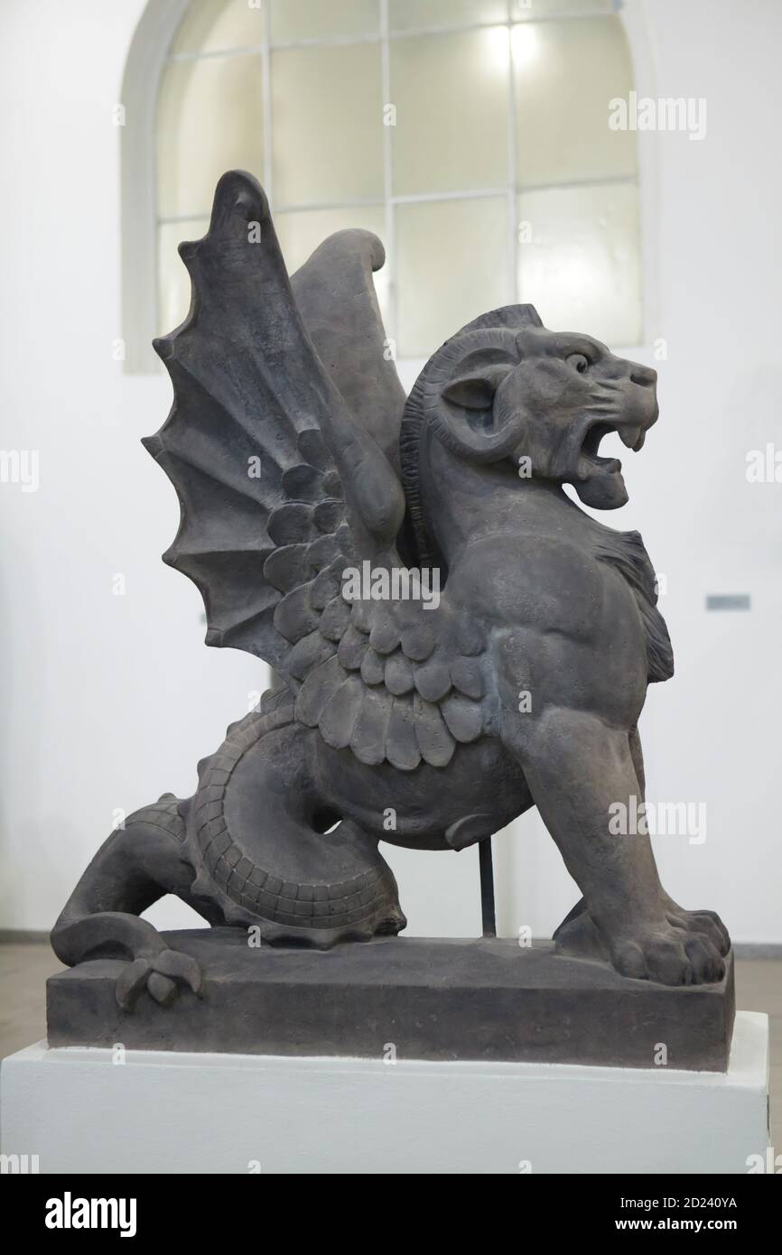 Griffin designed by Czech sculptor Bohuslav Schnirch (1887) once placed on the building of the National Museum (Národní muzeum) in Wenceslas Square (Václavské náměstí) in Prague, now on display in the Lapidarium of the National Museum (Lapidárium Národního muzea) in Prague, Czech Republic. The statue was removed to the museum after it was badly damaged during the Soviet invasion to Czechoslovakia in August 1968. Stock Photo