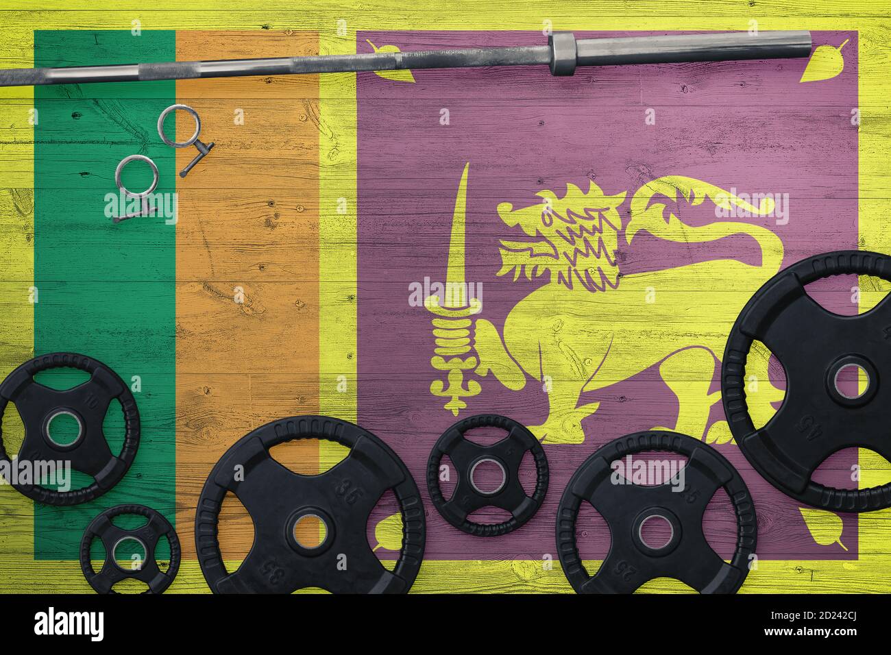 Sri Lanka gym concept. Top view of heavy weight plates with iron bar on