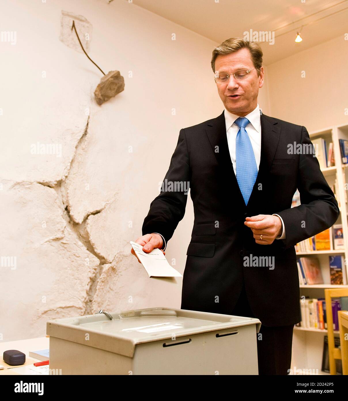 Free Democratic Party (FDP) party leader Guido Westerwelle casts his vote during the European Parliament elections at a parish office in Bonn June 7, 2009. REUTERS/KNA-BILD/Kirsten Neumann (GERMANY POLITICS ELECTIONS) Stock Photo