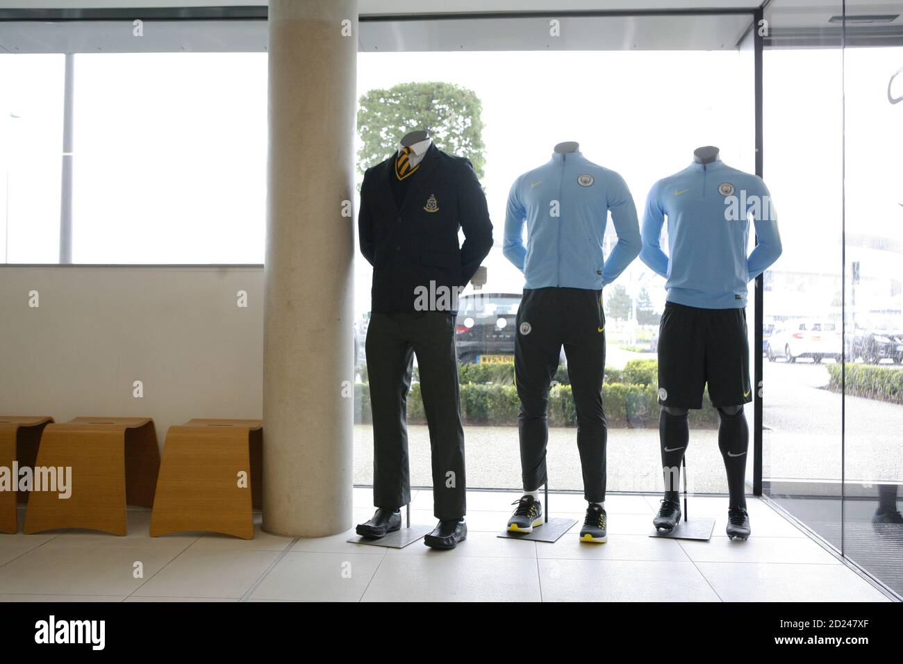MCFC Academy  Academy Uniforms and standards of dress on display in the academy Foyer. Stock Photo