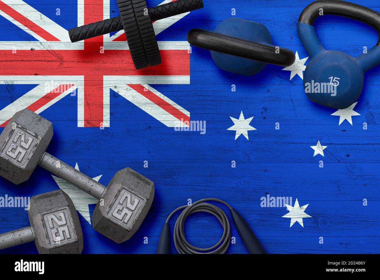 Australia sports club concept. Top view of heavy weight plates with