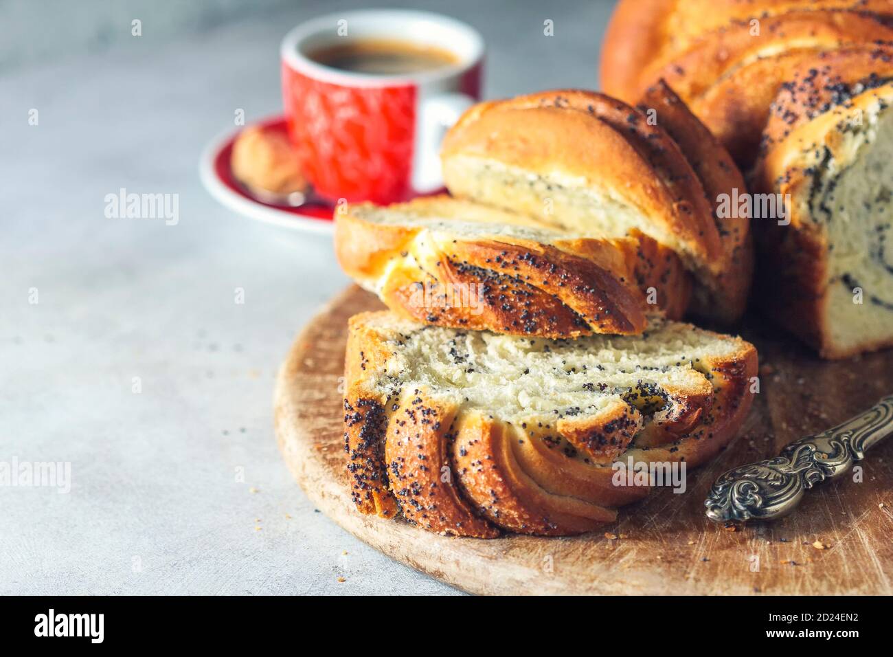Homemade poppy seed braided bread . Wreath. National pastries. Babka