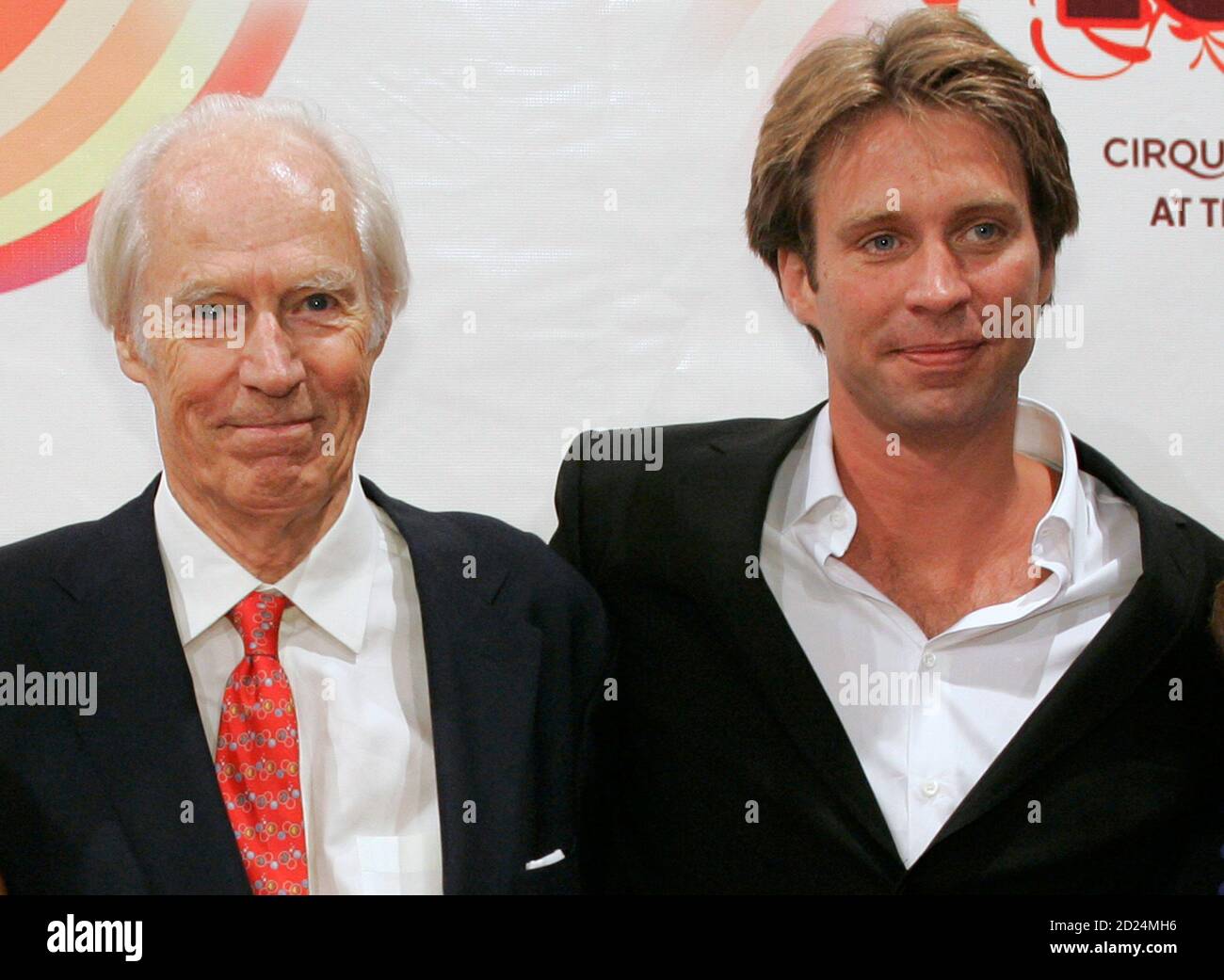 George Martin (L), the original Beatles producer, and his son Giles Martin arrive for the gala premiere of 'The Beatles LOVE by Cirque du Soleil' at the Mirage hotel and casino in Las Vegas, Nevada, June 30, 2006. Stock Photo