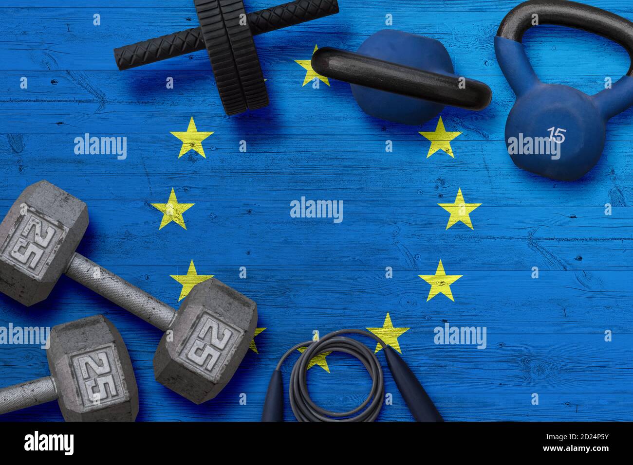 European Union sports club concept. Top view of heavy weight plates
